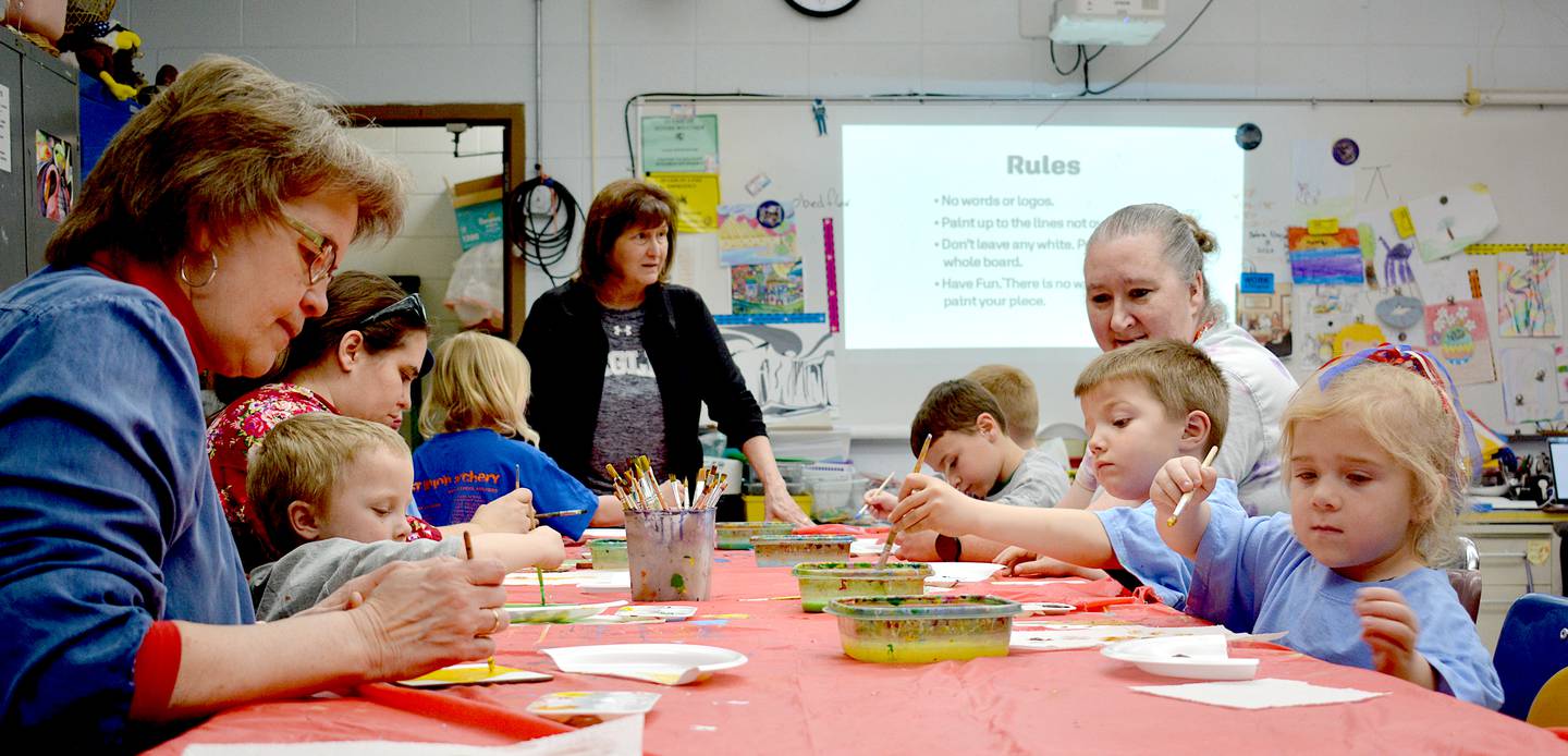 Students of all grades and staff worked over three school days to paint individual squares for the mural.