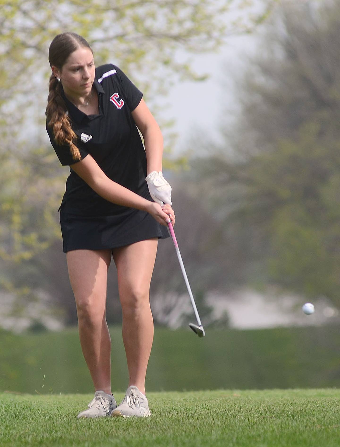 Creston's Nora Barton chips onto the No. 3 green at Crestmoor Tuesday.