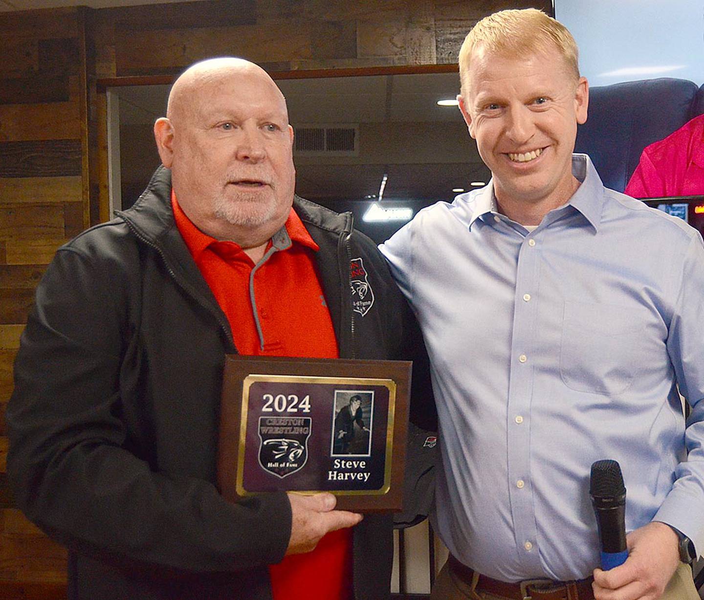Steve Harvey, 2024 Creston Wrestling Hall of Fame inductee, with son Shawn Harvey. Harvey was Creston's first state finalist in 1972.