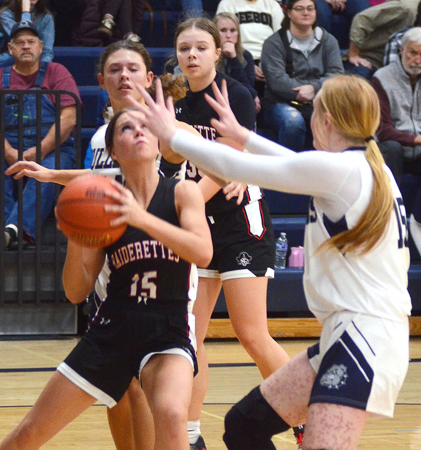 MaKel Jones of Mount Ayr looks to score inside against Paisley Sleep of Bedford.