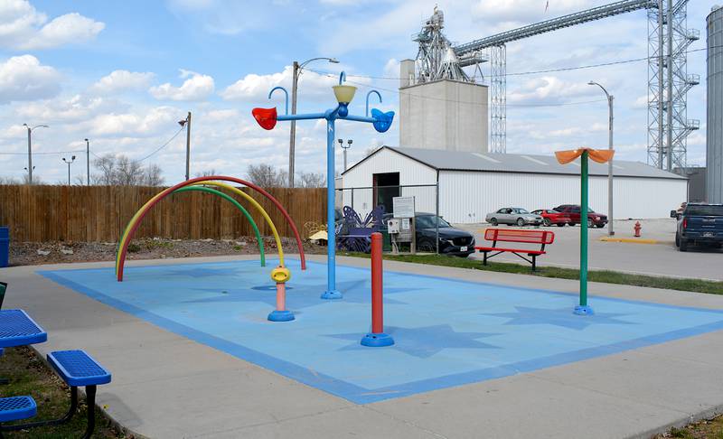 The splash pad in the Afton Park square. A chain link fence has been proposed to help keep kids safe from traffic in the nearby street.