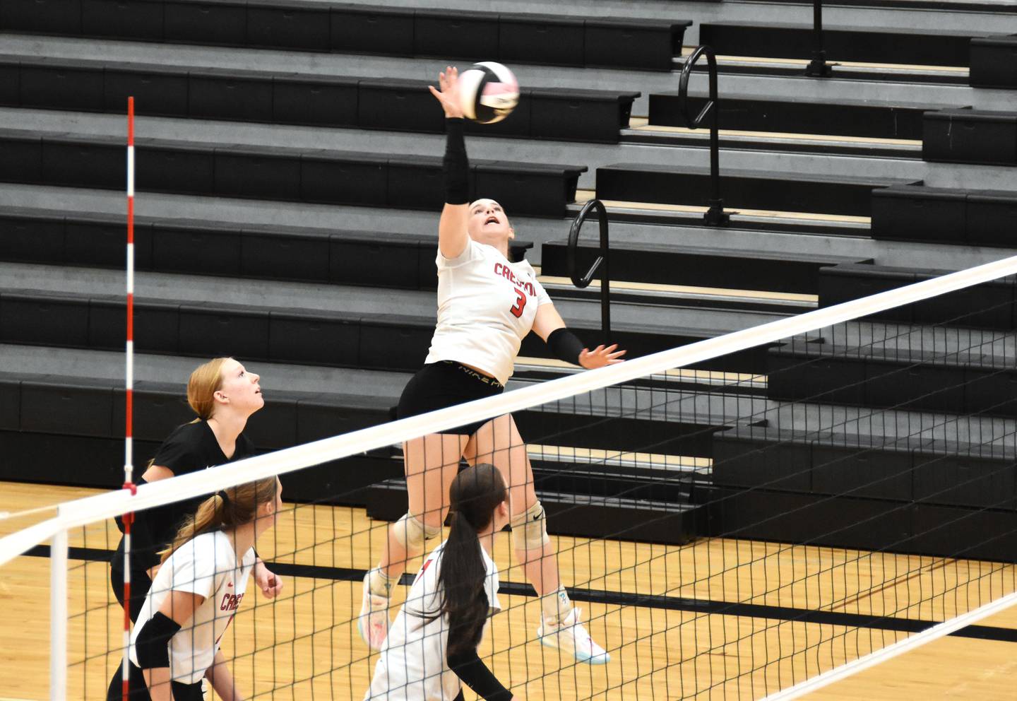 Jaycee Hanson puts up an attack Thursday in a 3-0 regionals loss to Glenwood. Hanson contributed four kills and six digs.