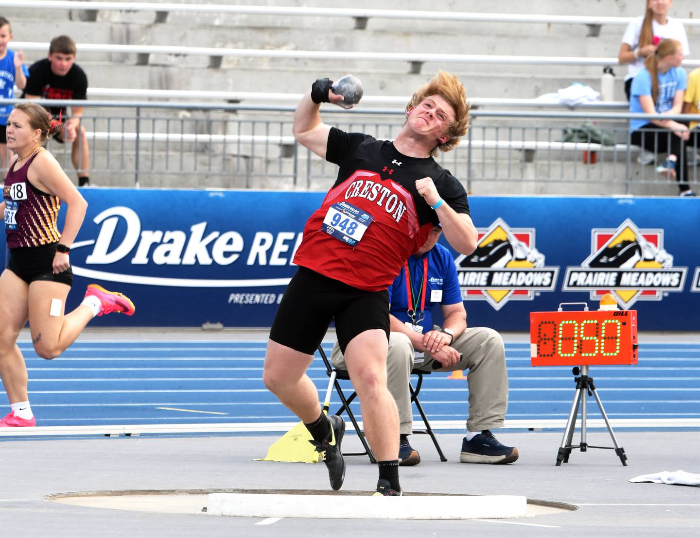 Creston sophomore Tom Mikkelsen throws a 56-02.75 in the shot put finals Thursday, a mark that earned him third place.