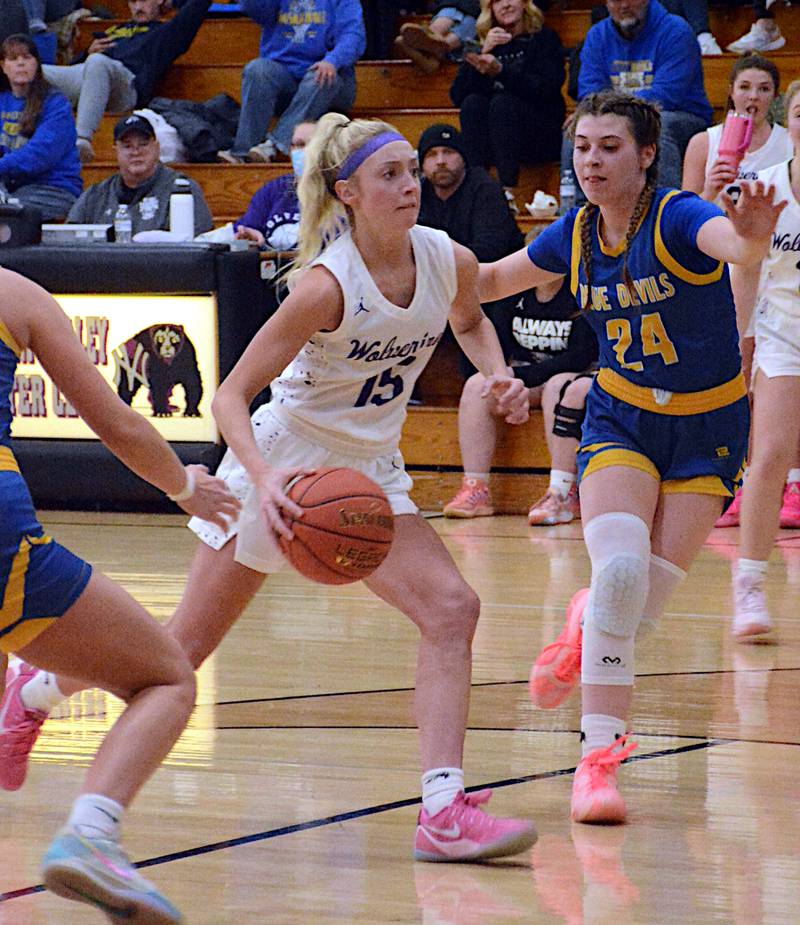 Nodaway Valley senior Izzy Eisbach drives to the hoop last Friday in the first quarter of a game against Class 1A No. 13 Martensdale-St. Marys. The Wolverines came away with a 73-47 win, and Eisbach led the way with 37.