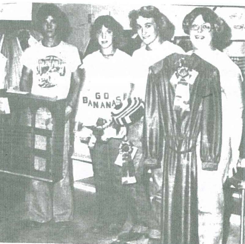 From left, Kevin Day of Creston with a curio shelf; Anne Bennett of Creston with a banana bread comparison; Tom Day of Creston with a nut bowl and Lori Ann Haight of Ellston with a dress. The four are eligible to compete in the state fair competition.