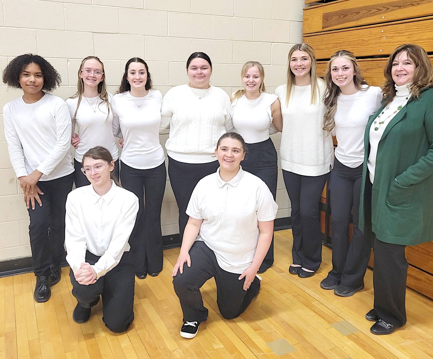 Members of the Orient-Macksburg readers theatre group are from left in front, Ava Jenkins and Emily Butler; back row: Malaki Jackson, Addie Shinn, Marissa Cass, Natalie Mullen, Carter Osborne, Emma Boswell, Kolbie Carson and coach Kendra Breitsprecher.
