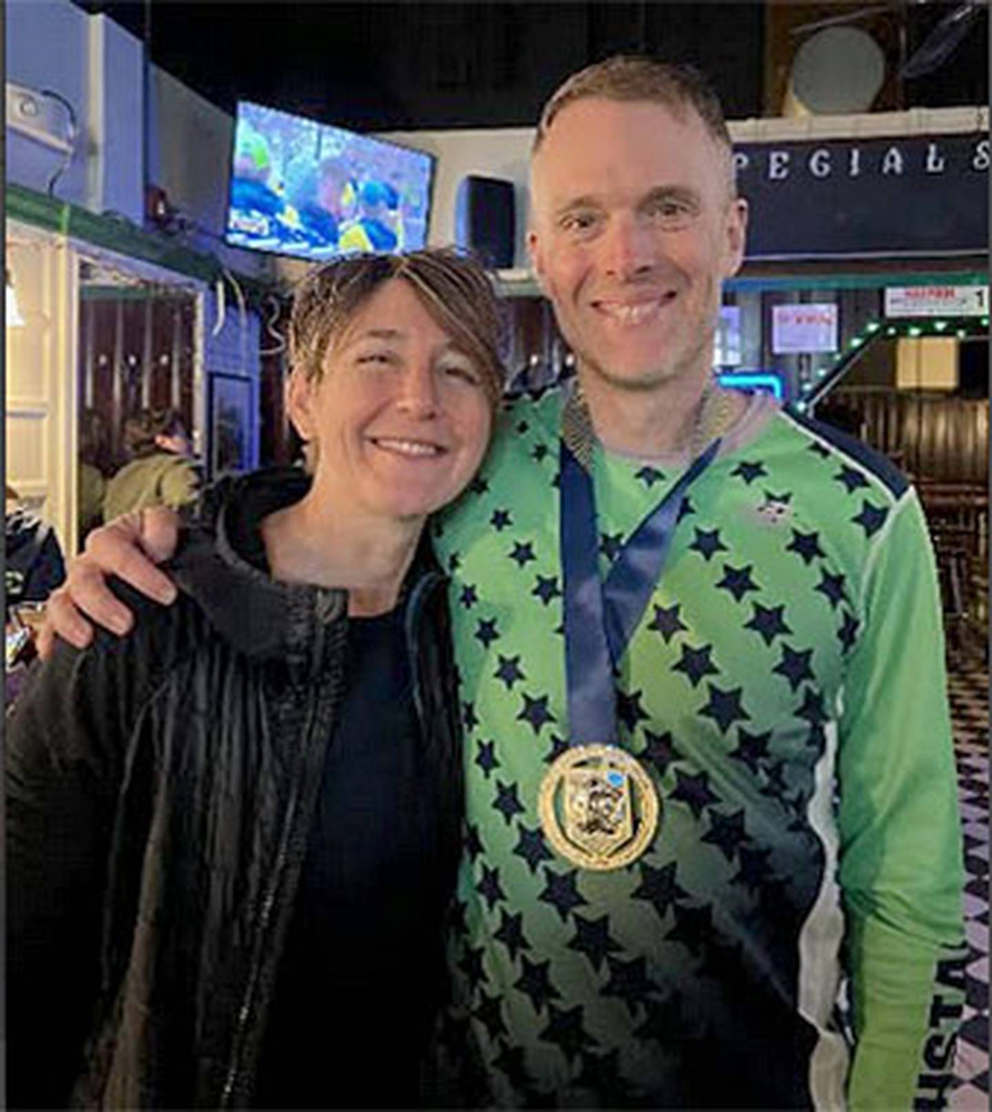 Brian Davenport with wife Ann after running the 2026 Boston Marathon.