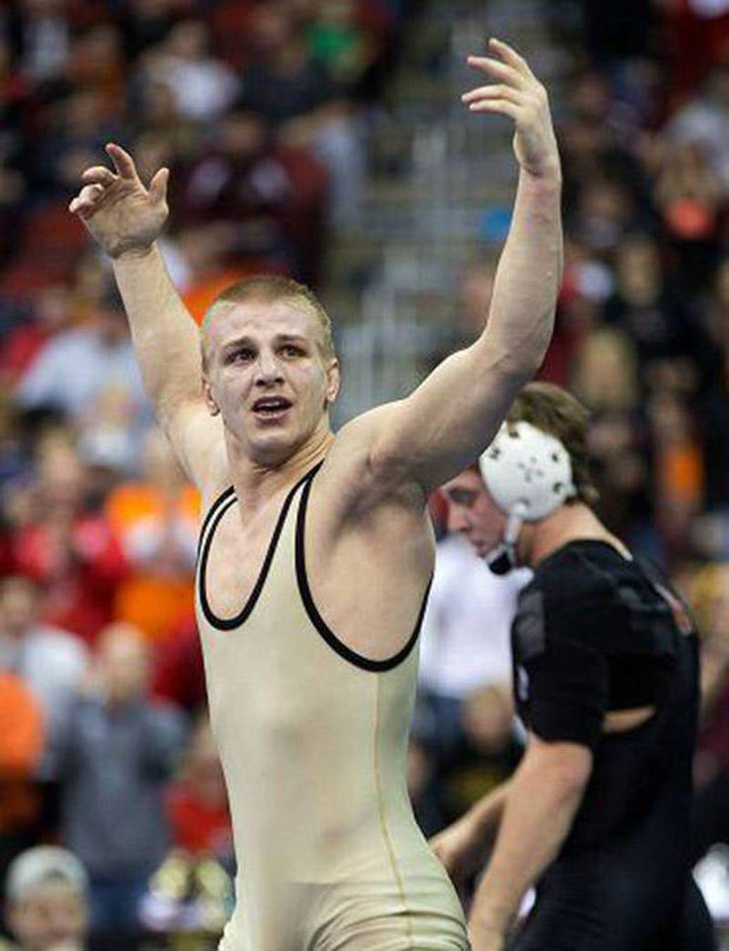 Jake Marlin celebrates after earning his fourth straight wrestling state championship in 2013. Marlin was inducted into the IHSAA Wrestling Hall of Fame this year.