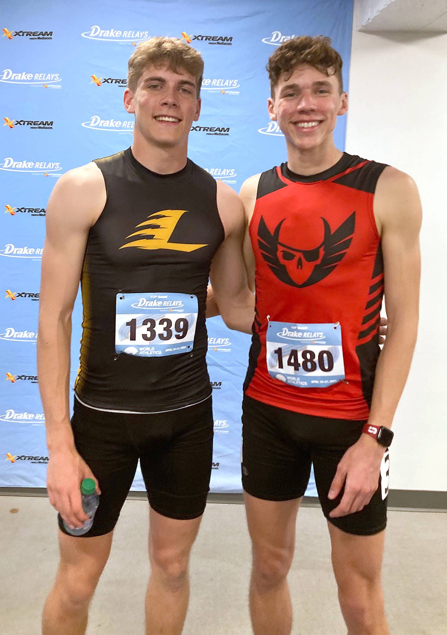 Pride of Iowa Conference rivals Gabe Funk of Lenox (left) and Ryce Reynolds of Mount Ayr are shown in the media room after placing fourth and second, respectively, in the Drake Relays 400 meter hurdles.