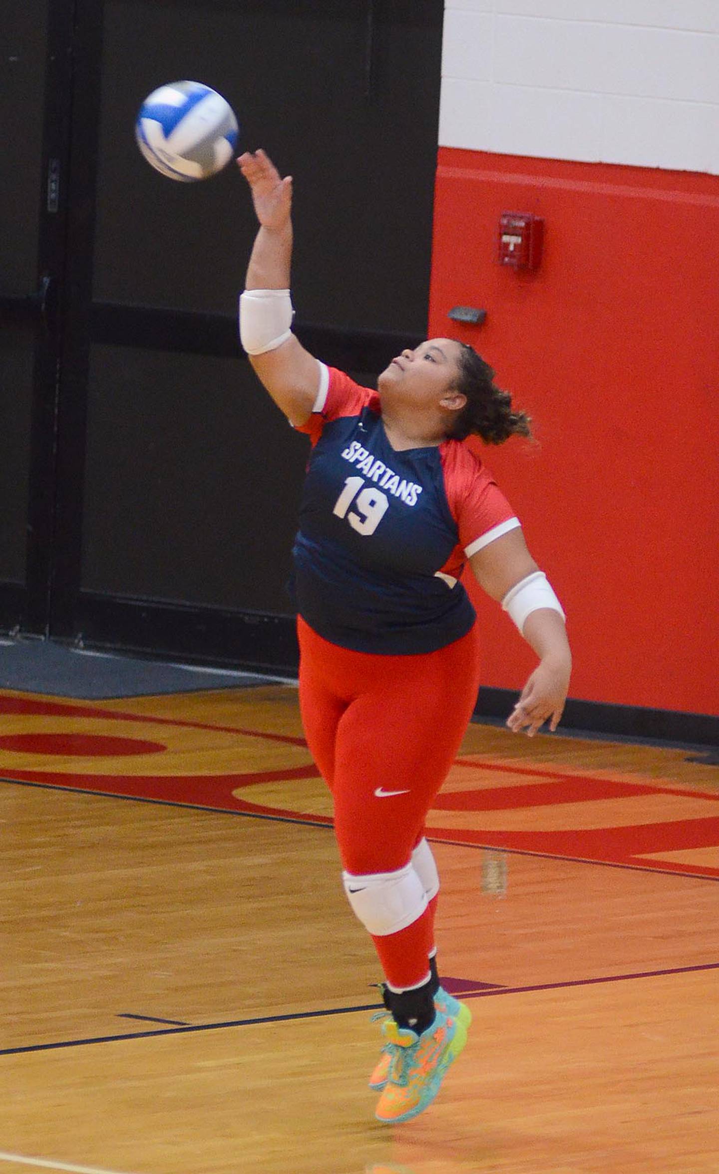 Atalia Garrison serves for Southwestern against Central Community College.