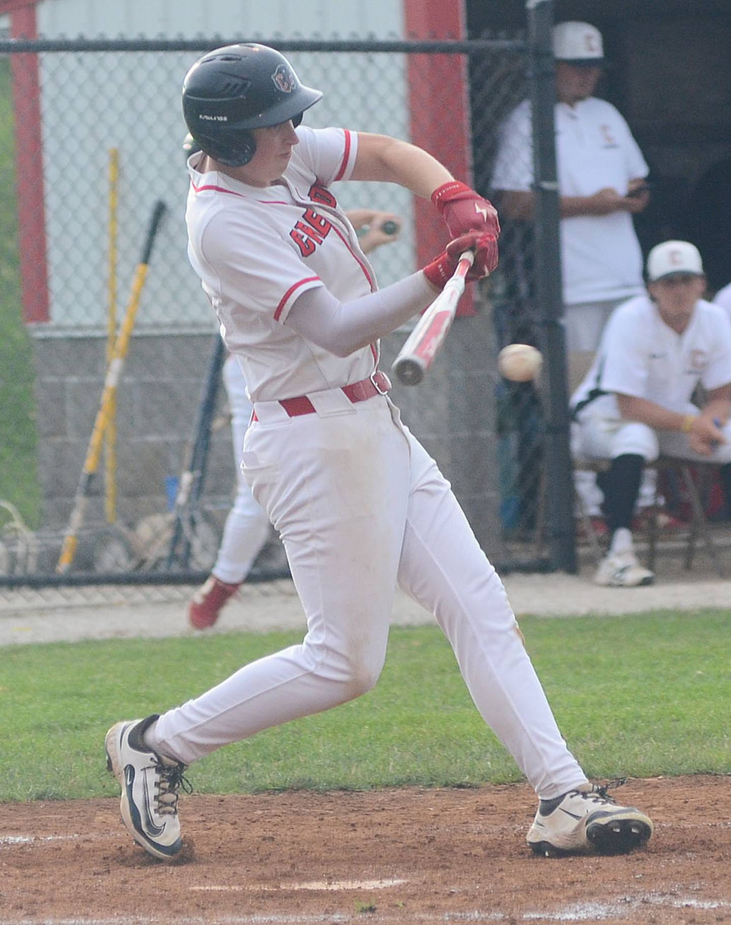 Creston second baseman Rhett Driskell connects with a pitch. Driskell was safe on an error on the play.