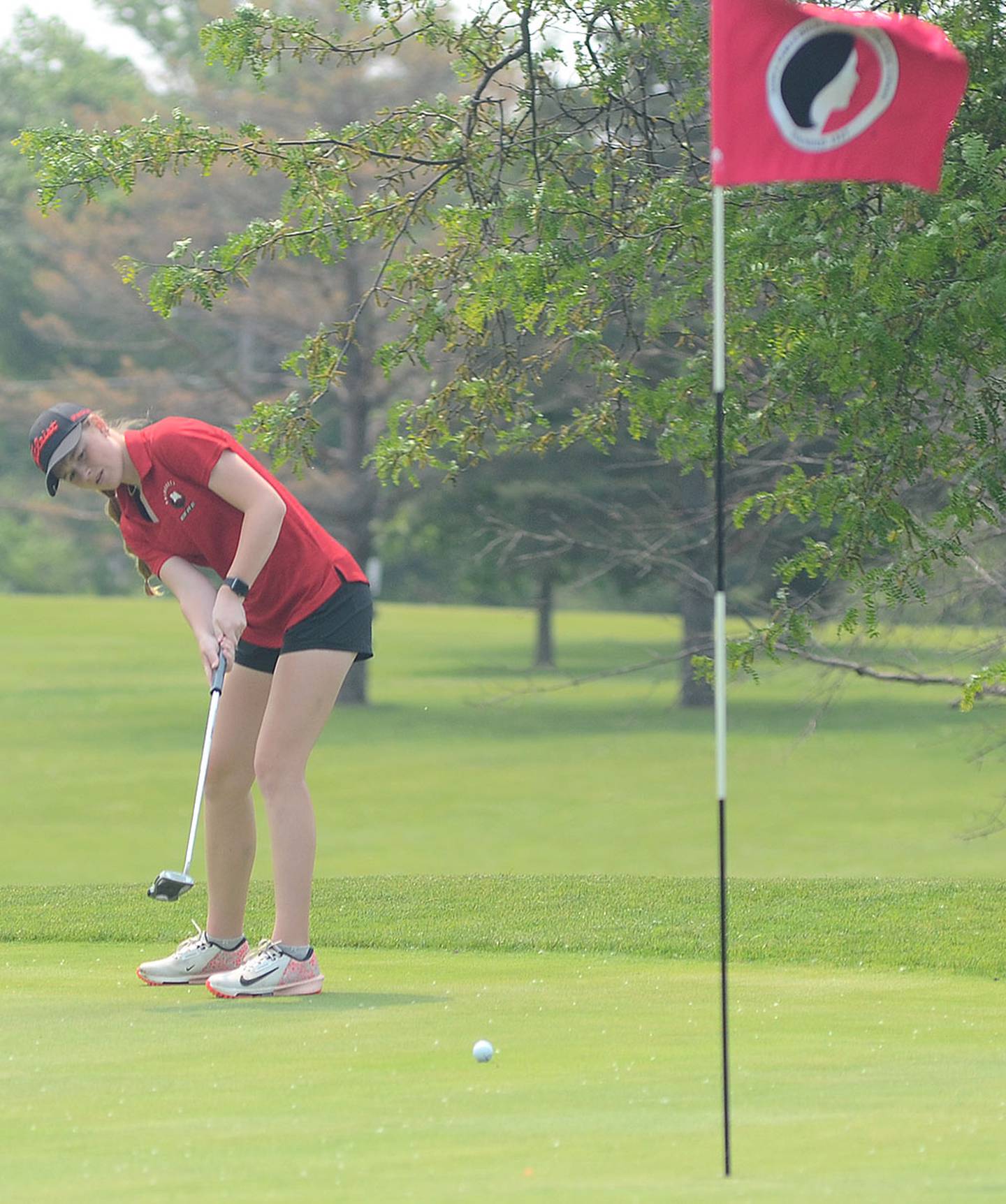 Mount Ayr's Jaylee Shaffer watches her putt approach the cup during Friday's action at the state tournament in Marshalltown. Shaffer shot 79-77 — 156 to win by four strokes.