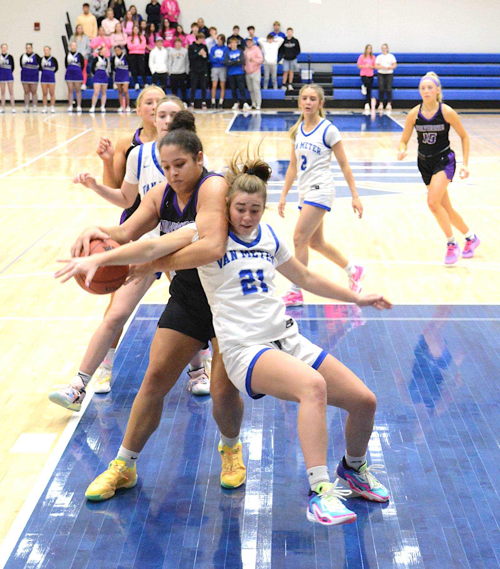 Big shots lift Wolverines from foul trouble to beat Van Meter Creston
