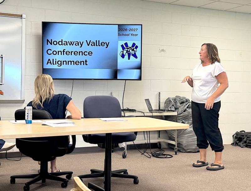 Nodaway Valley Activities Director Sara Honnold presents information on conference affiliation and realignment to the school board Tuesday, July 15.