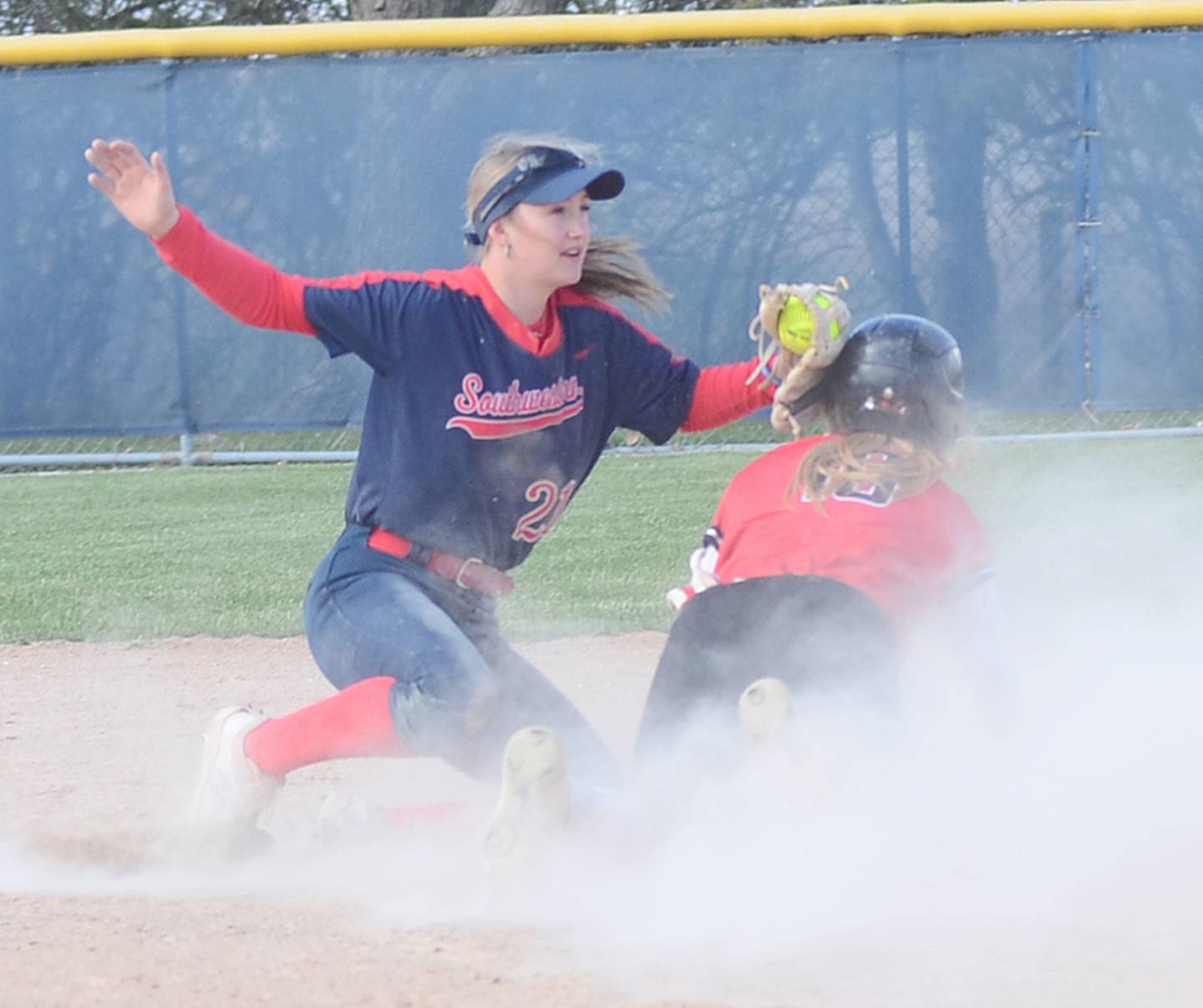 Southwestern shortstop Ashton Willis tags a North Central Missouri runner on a stolen base attempt during Thursday's doubleheader.