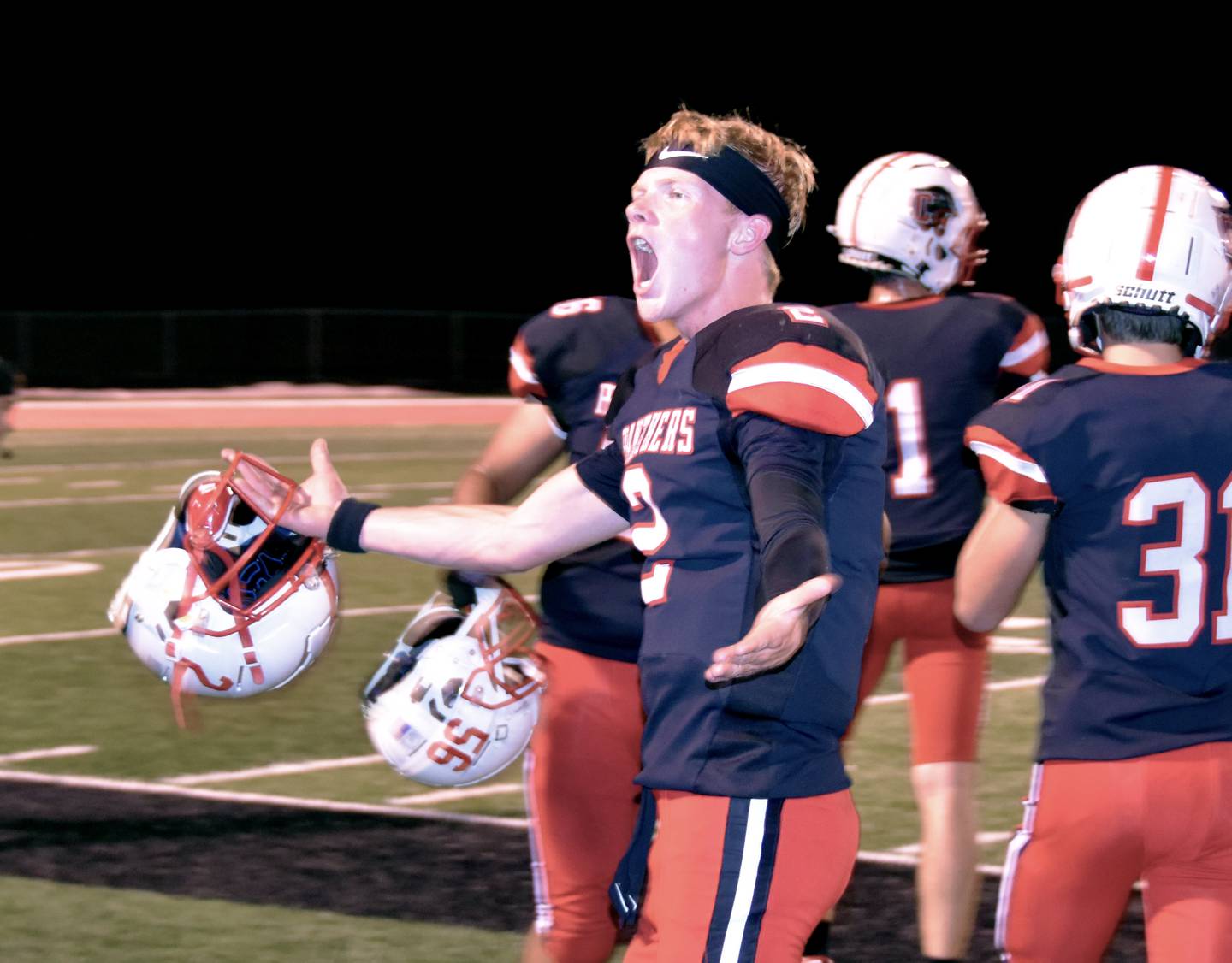 Quarterback Tanner Ray gets the crowd pumped up for the final defensive stand.