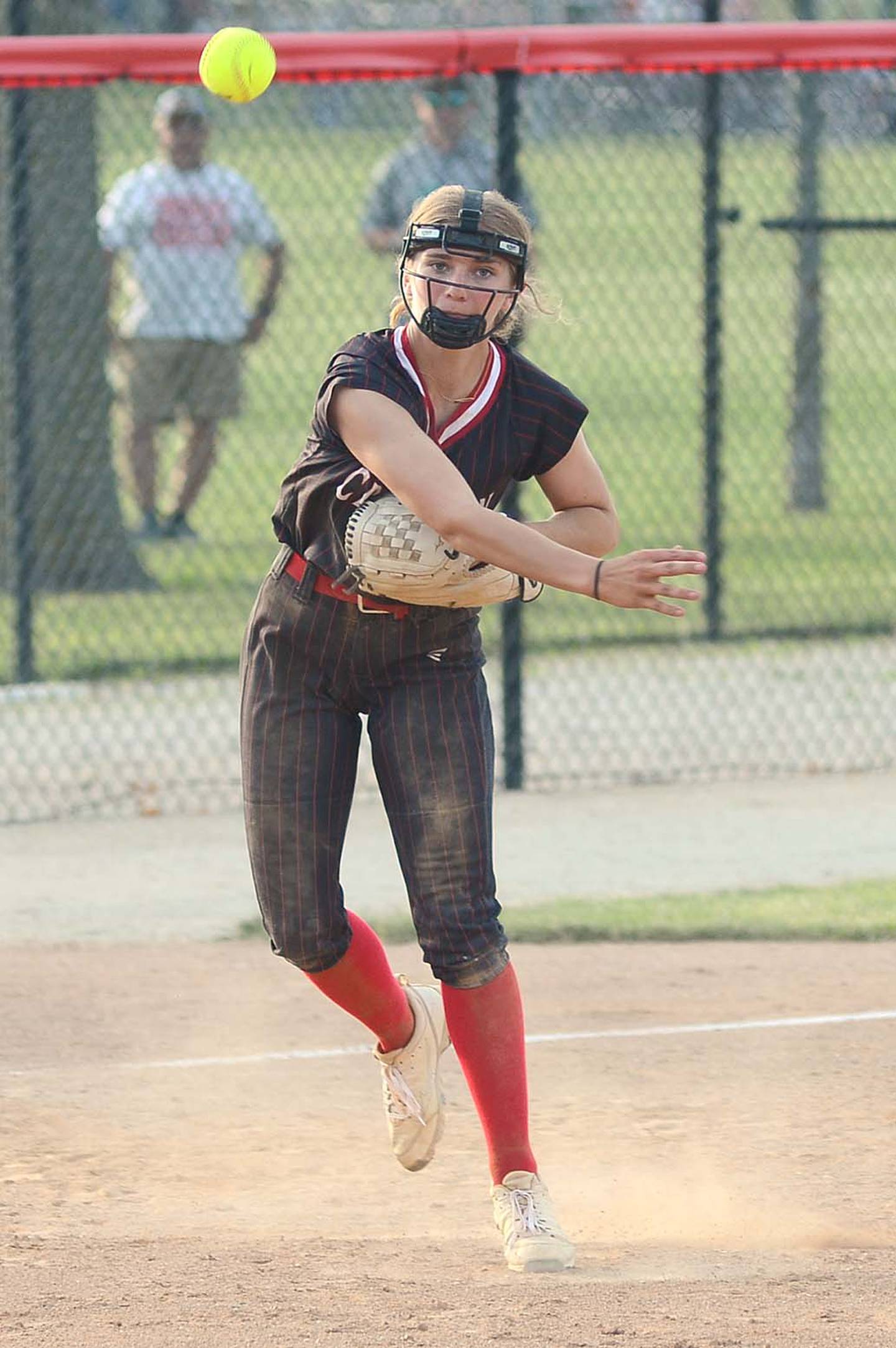 Evy Marlin looks toward teammates at home plate and greets assistant coach Gracie Hagle after rounding third base moments after Marlin's first home run as a Panther in Monday's 12-10 win over Atlantic.