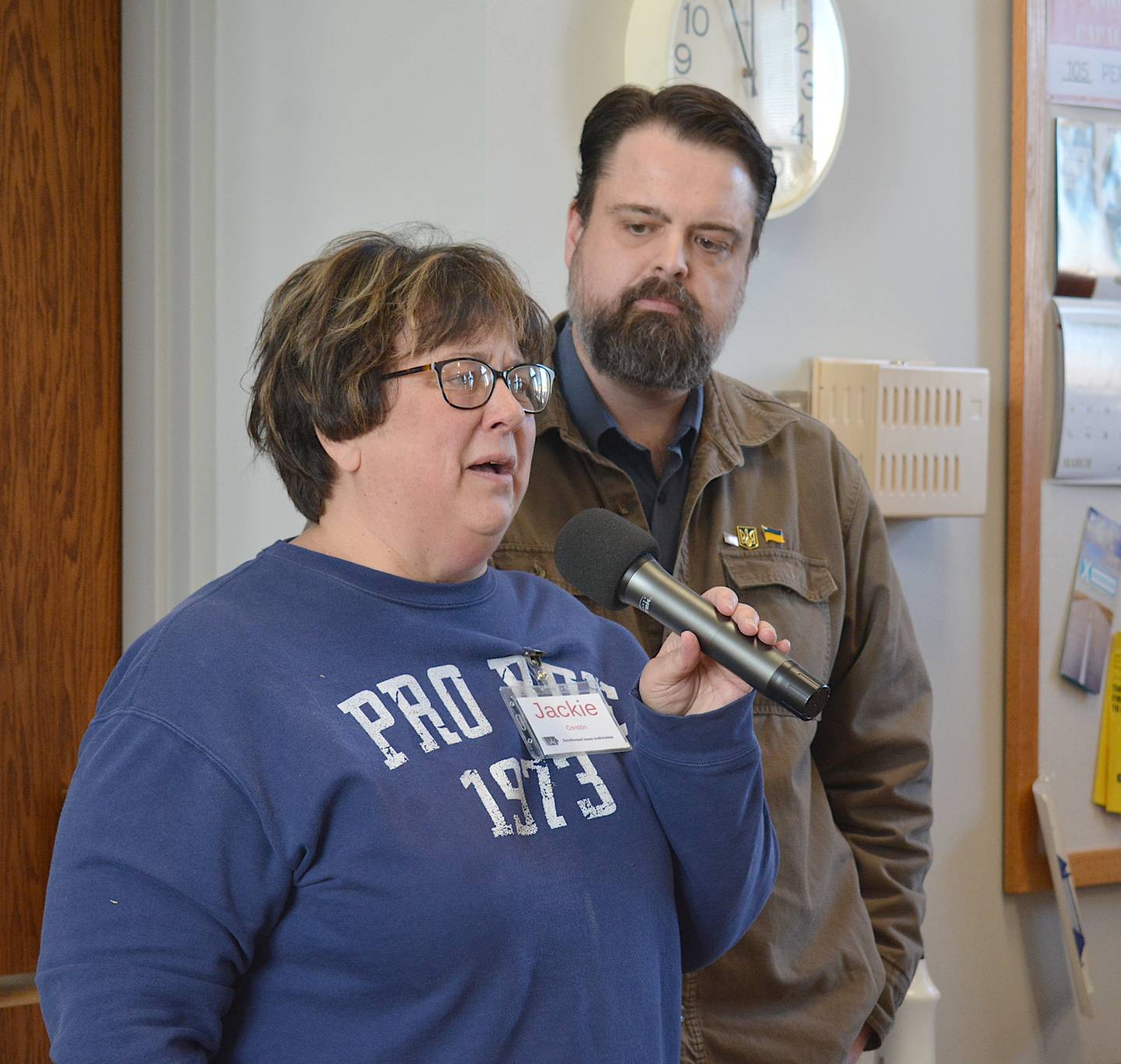 Jackie Cordón delivers an emotional speech to the town hall.
