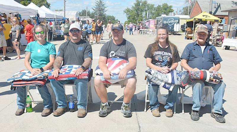 Receiving quilts were from left, Jessie and Rob Christensen of Winterset, Joseph Beaman of Creston, Pam Shady of Shannon City and Philip Lovely of Orient.