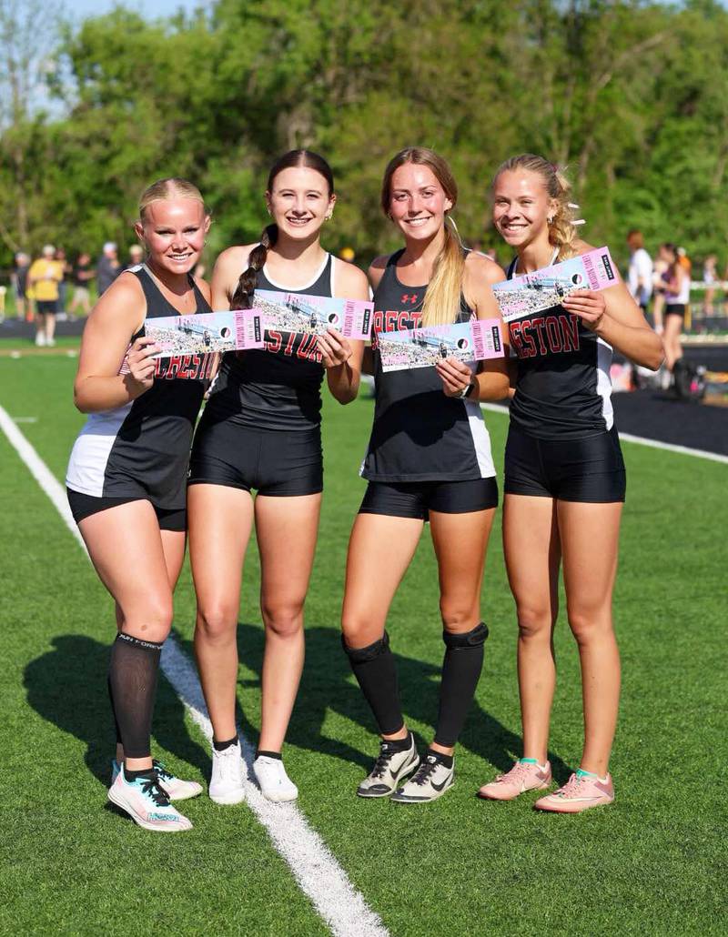From left, Maylee Riley, Hope Henderson, Payton Davis and Cora Smith show off their tickets to state after placing second in the 4x800m relay in a season-best time of 9:45.53 at the state qualifying meet in Glenwood. The girls will race at 11:20 a.m. Thursday in heat two.