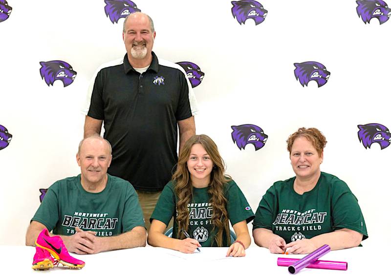 Joined by parents Dennis and Connie Lundy, as well as Nodaway Valley girls track coach Brett Welsch, Emma Lundy signs her national letter of intent to compete in track and field beginning next year at Northwest Missouri State University.