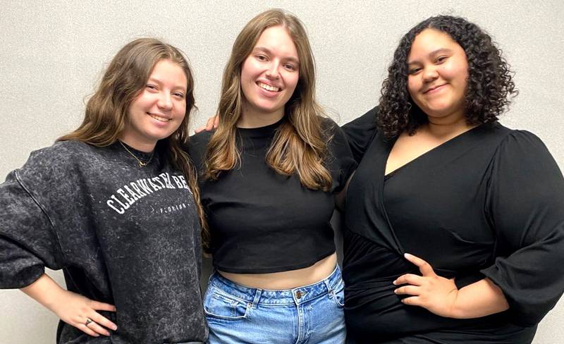Abby Collins is one of Wayne State College's three drum majors. From left, Collins, Taylor O'Dell and Aiyanna Frizane.