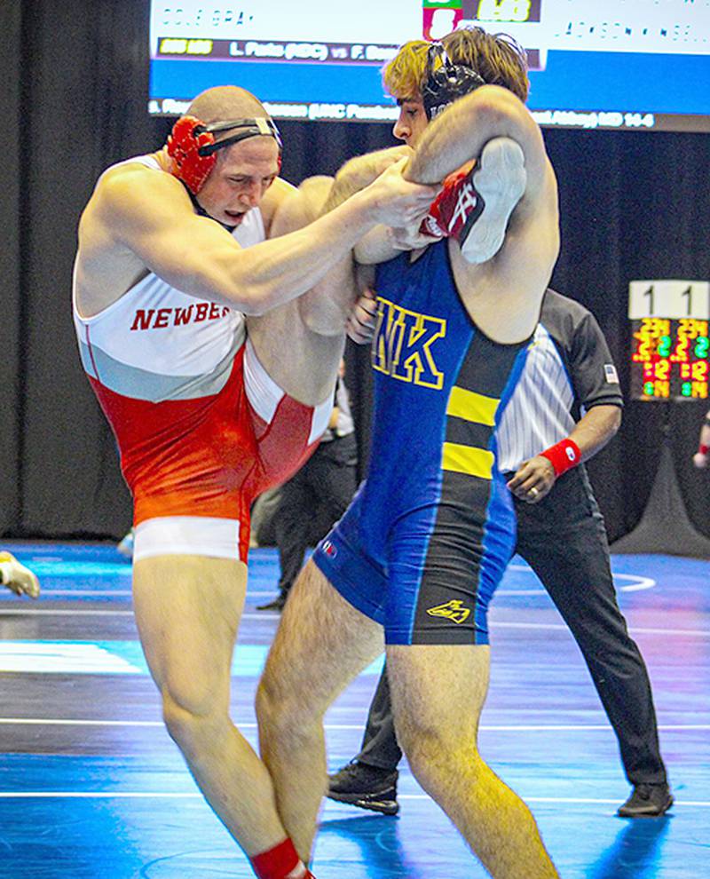 Nebraska-Kearney wrestler Jackson Kinsella works for a takedown during his 8-4 consolation victory over John Parker-Wilson of Newberry College. Kinsella placed fourth in the tournament.