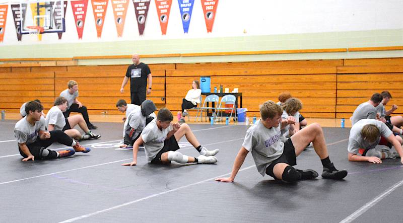 Nodaway Valley/O-M's wrestling team goes through drills in a practice open to the public recently in the high school gym. The Wolverines begin the season Thursday, Nov. 30 at home against West Central Valley, ACGC and East Union.