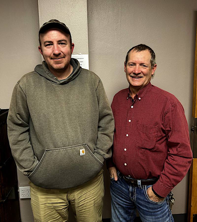 New Union County Conservation Department Director Mike Hilger, left, and retiring director Doug Jones during the formal change last week.