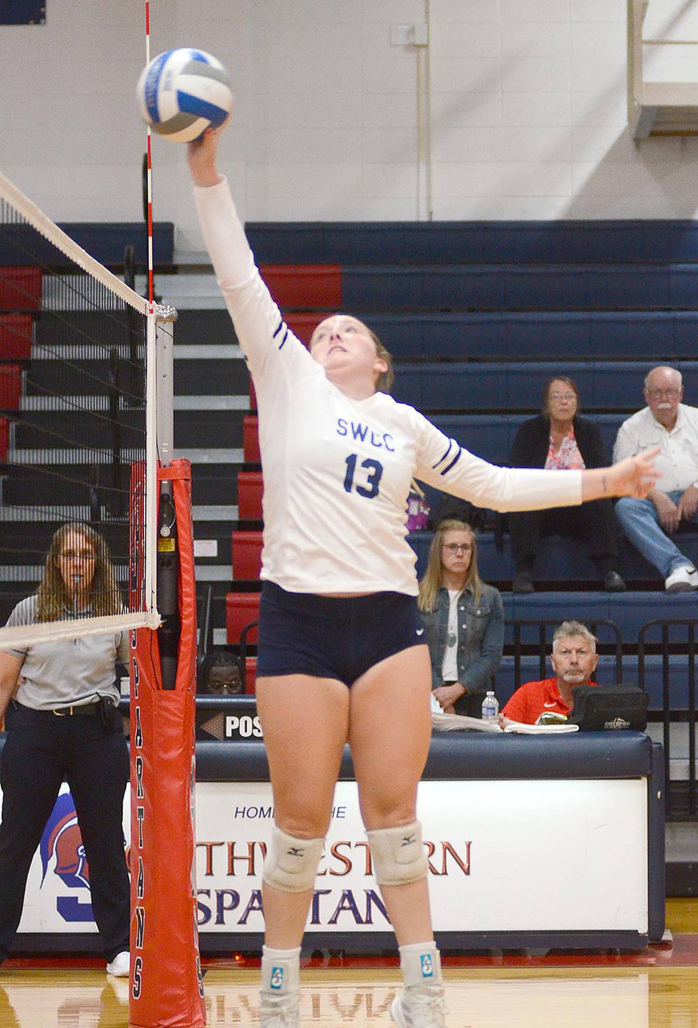 Southwestern setter Cadence Perkins of Bedford tips into the Western Iowa Tech court.