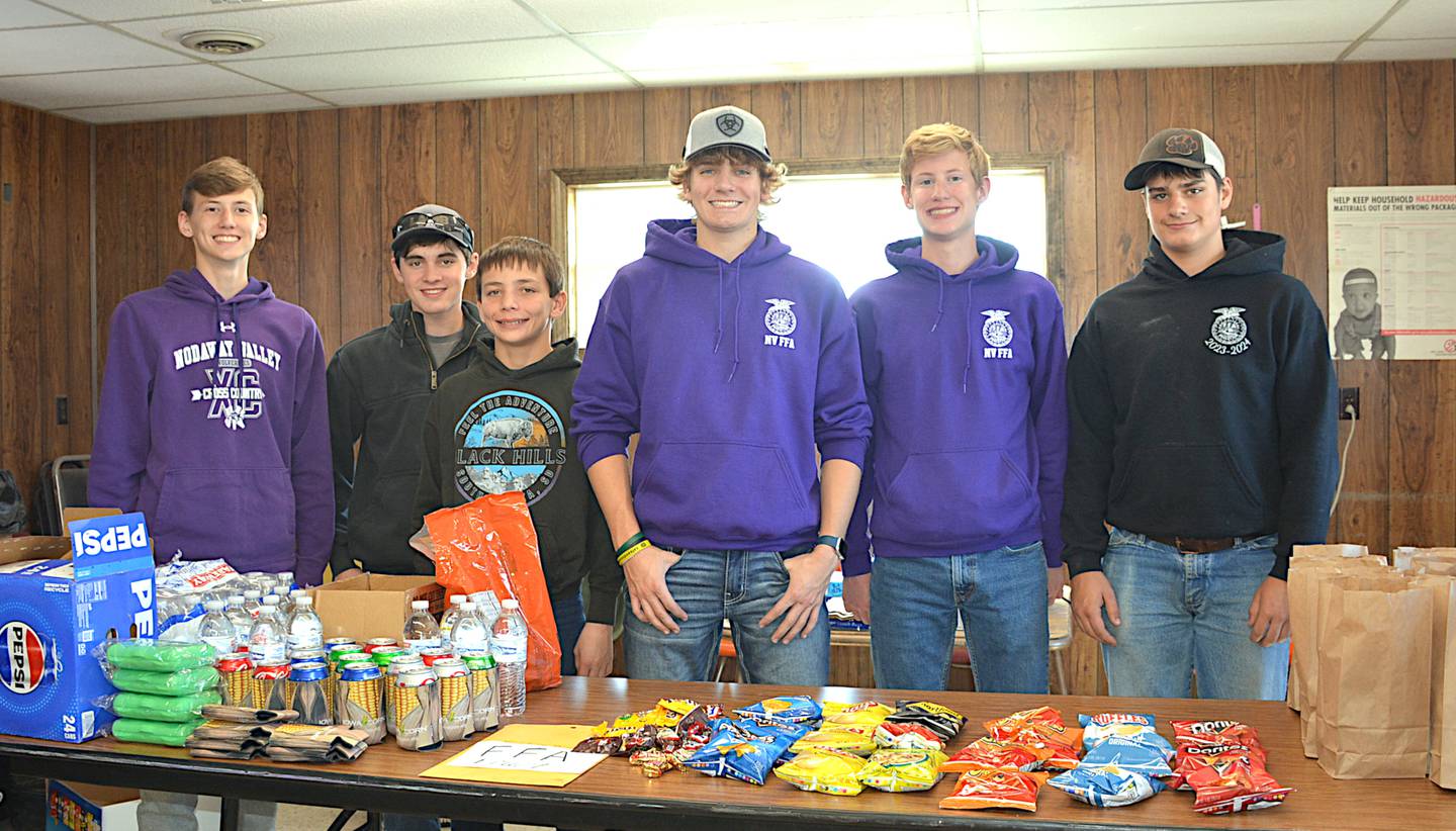 From left, students serving during a Feed the Farmer event in Greenfield were Paul Kading, Mark Kilborn, Josh Nelson, Ben Hoover, Luke Kading and Derek Raasch.