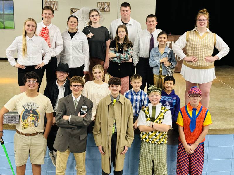 The cast of "Par for the Corpse," most in costume. FIRST ROW: Aiden Denton, Brock Driskill, Gabe Lauffer, Jake Findley, Zayett Clear. SECOND ROW: Wyatt Proffit, Liv Findley, Camden Clear, Charlie Shawley. THIRD ROW: Izzy Mohr, Anne Denton. FOURTH ROW: Khloe Parker, Cyler Wuebker, Reese Guiter, Riley Cheers, Dallas Harper, Carter Harper, Lexi Hansen.