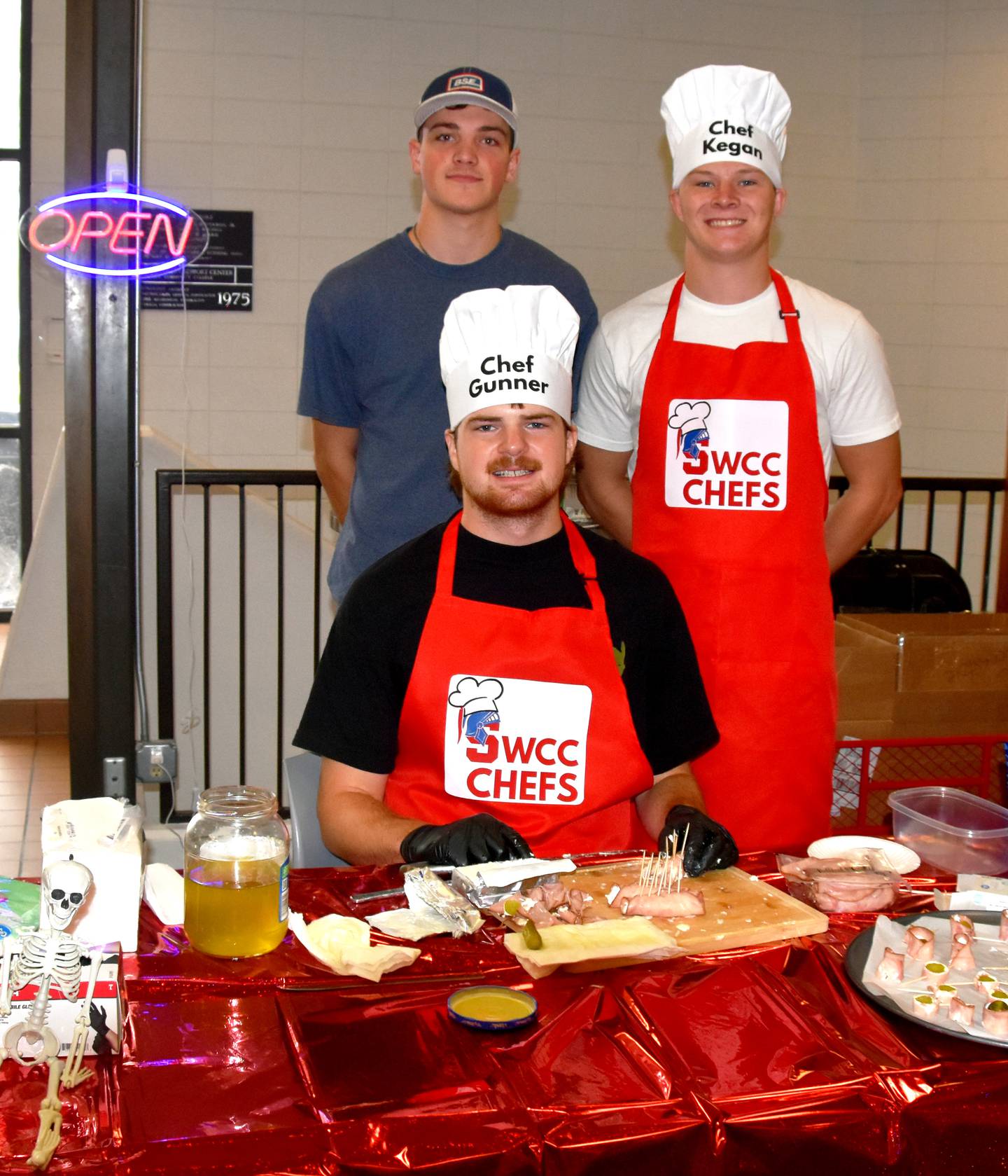 From left, videographer and editor Ryan Bower, Chef Gunner and Co-Chef Kegan