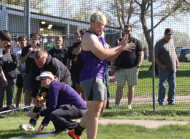 Nodaway Valley senior Trent Warner celebrates a Pride of Iowa Conference record-setting discus throw of 170-11 at the conference meet Monday, May 5.