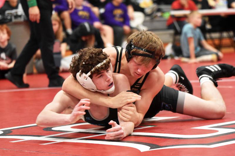 Austin Evans controls Jaxon Brewer of Lewis Central in the 144 lbs finals. Evans won the title in a 15-0 technical fall.