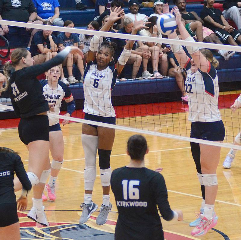 Southwestern's Danyelle Steinkuehler (22) and Skyelar Lawal (6) block a Kirkwood attack during Wednesday's home match. Lawal and Steinkuehler were SWCC's net leaders with a combined  11 kills and six blocks.