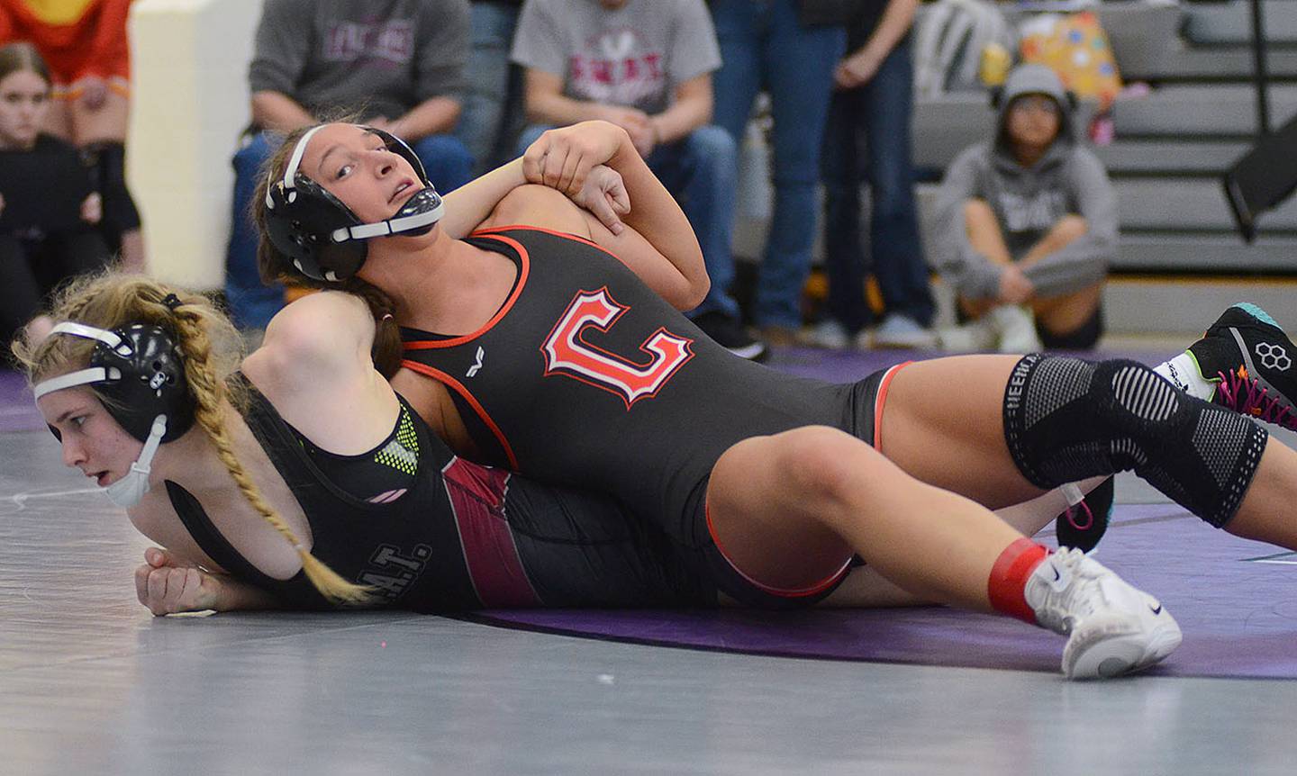 Creston junior Alainah Galanakis works to gain nearfall points against SWAT's Erin South in a consolation match Saturday. Galanakis placed fourth at 130 pounds.