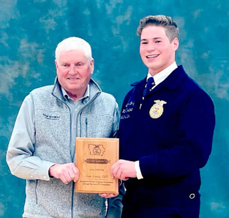 Creston High FFA member Tucker Rohrig, right, qualifies for the National FFA Convention Wednesday through Saturday at Indianapolis, Indiana.