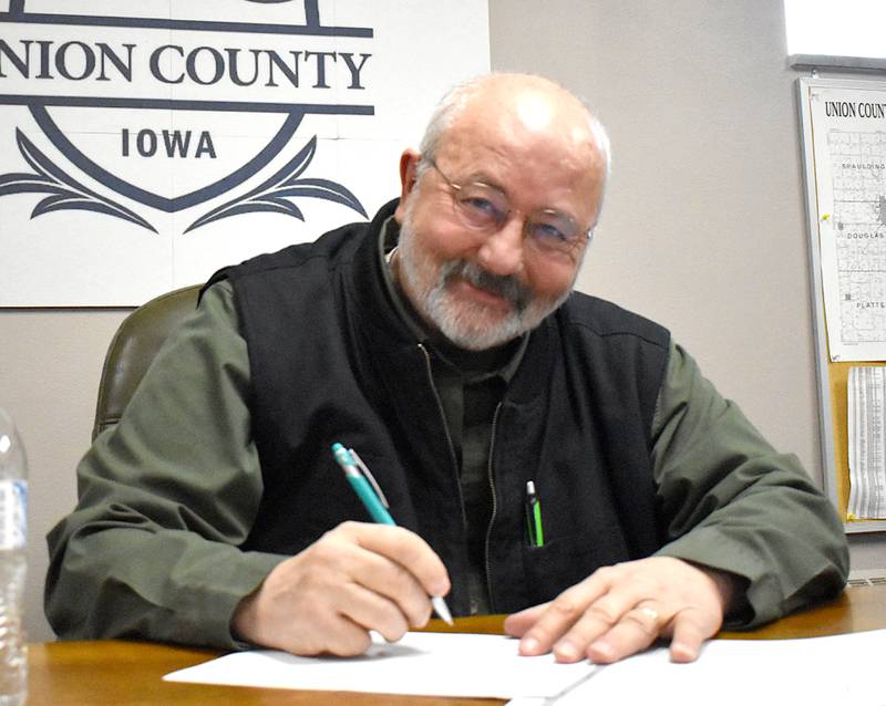 Rick Friday, at the desk where he serves as a Union County supervisor.