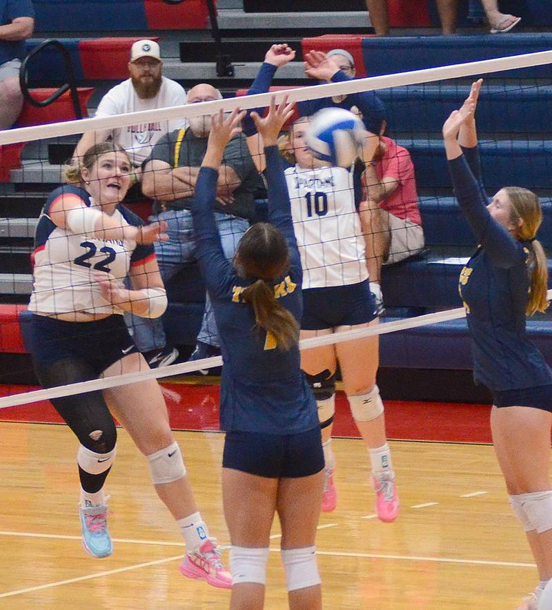 Southwestern's Danyelle Steinkuehler of Woodbine sends one of her 10 kills into Marshalltown's court during Thursday's home match.