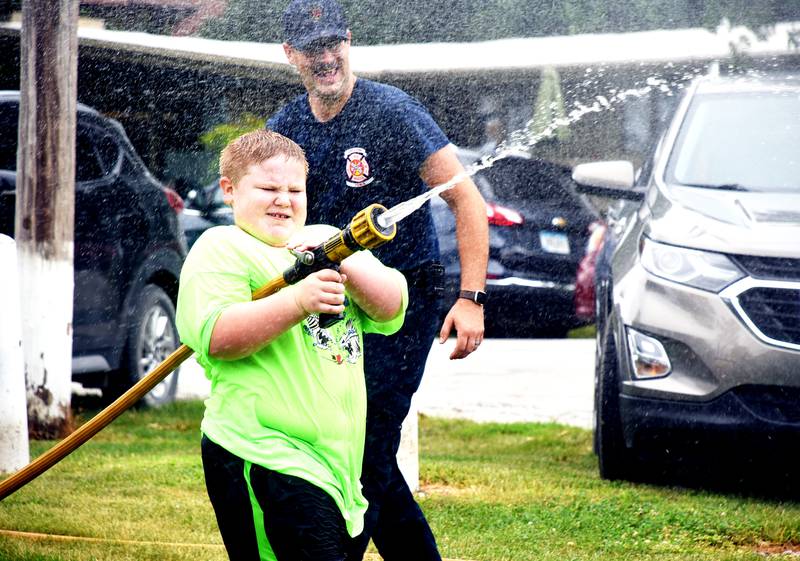 During McKinley Park Fest, children get to try out the equipment from the Creston Fire Department. The Creston Parks and Recreation Board is looking to combine this festival with Party in the Park.
