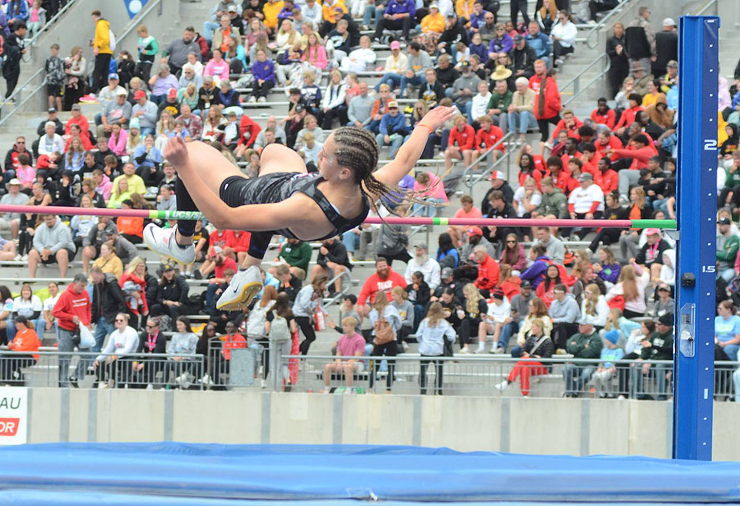 Aubree Shields of Mount Ayr clears 5 feet, 5 inches in the high jump to win the Class 1A event Friday. It was her fourth time finishing in the top three at state, and her first championship.