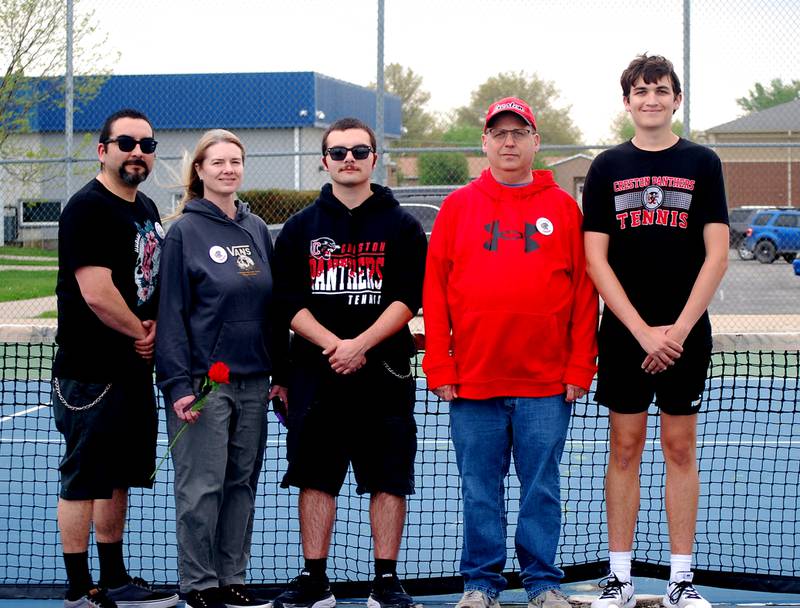 Tennis seniors Damien Flores and Spencer Brown pictured with their parents Thursday at senior night. From left, Gabe, Christina and Damien Flores, Clint and Spencer Brown. Not pictured, Heather Wolf, mother of Spencer Brown.