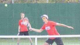 Clarke wins tennis dual
