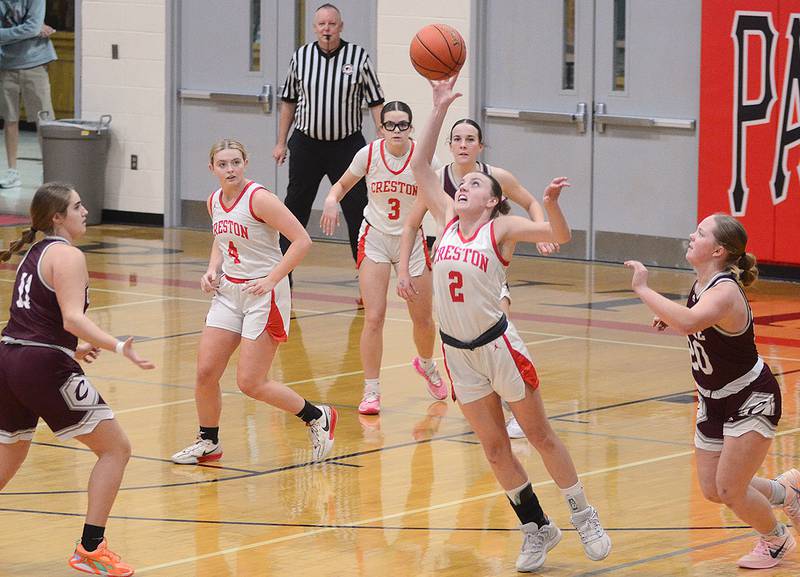 Creston's Hollynn Rieck reaches to tip a Clarke pass to start a Panther fast break. Rieck had nine points, seven assists, six rebounds and three steals in the 58-46 win. Other defenders shown are Ella Turner (4) and Braylee Pokorny (3).