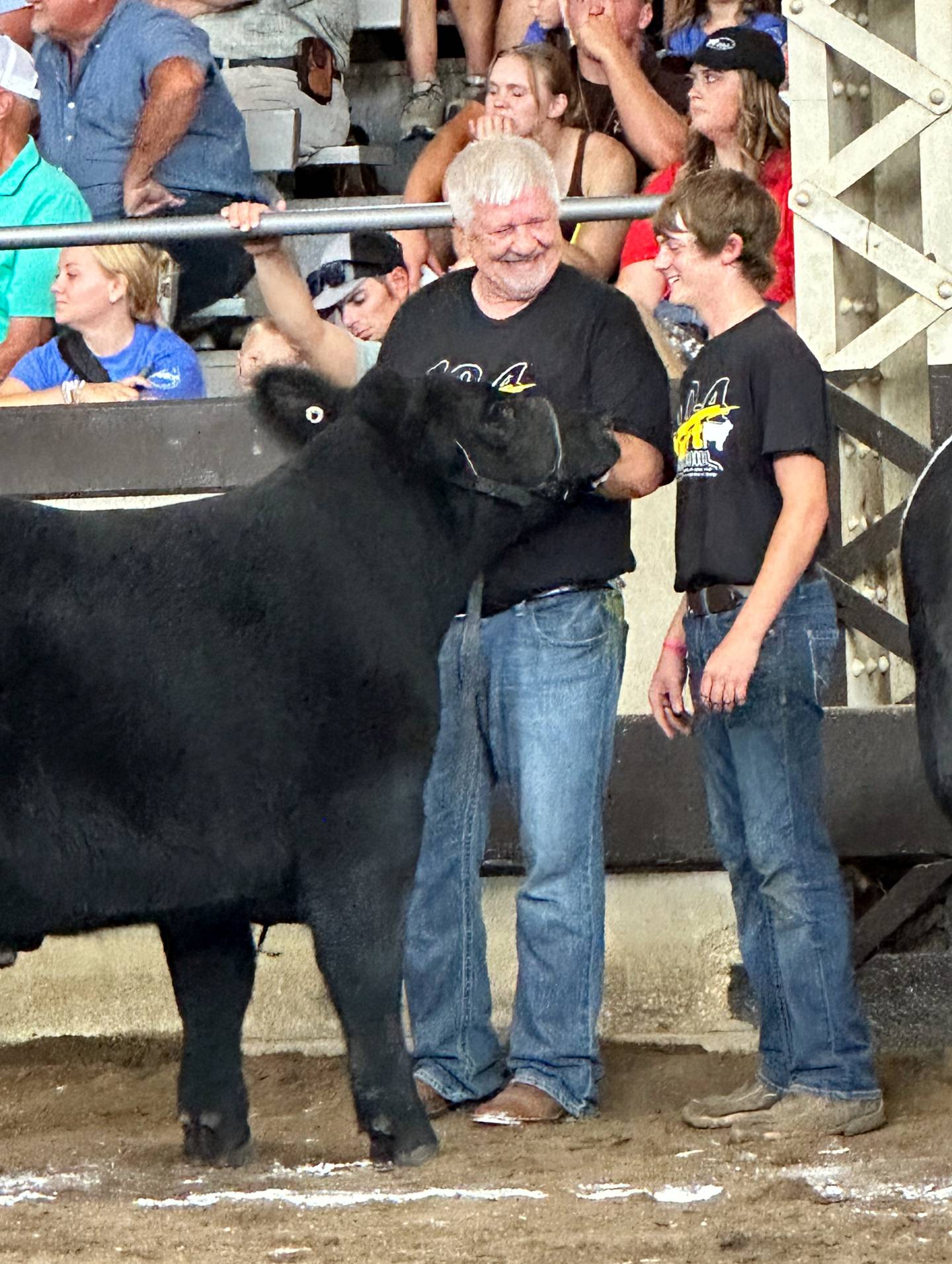 Adair County farmer Ralph Lents, with Lytton's Tucker Freimuth, showing the steer Burt Reynolds at the Governor's Charity Steer Show.