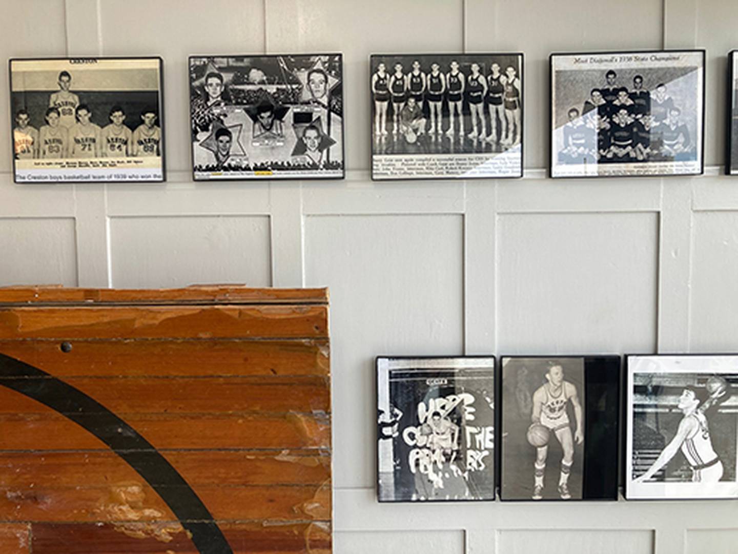 Historical basketball photos are part of the display that will be dedicated in Saturday's public event at Anson's Bar and Grill.