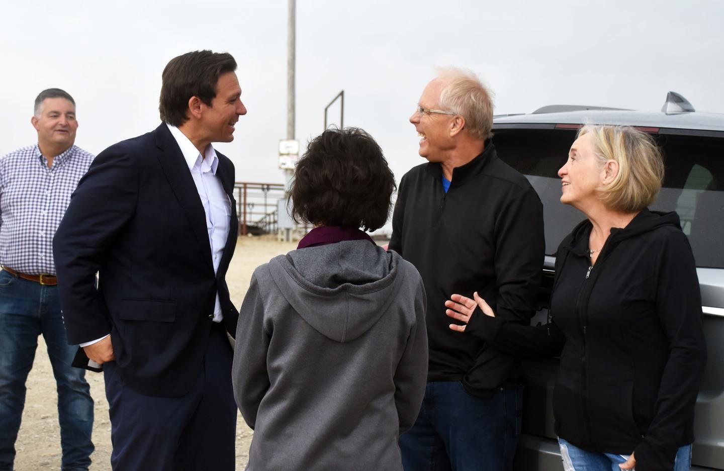 Iowans now moved to Florida talk to DeSantis about their experiences in both states.