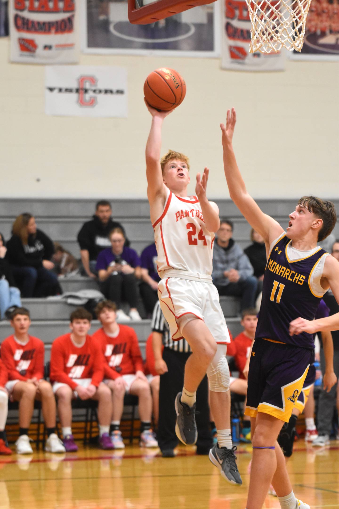 Tanner Ray puts up a contested layup.