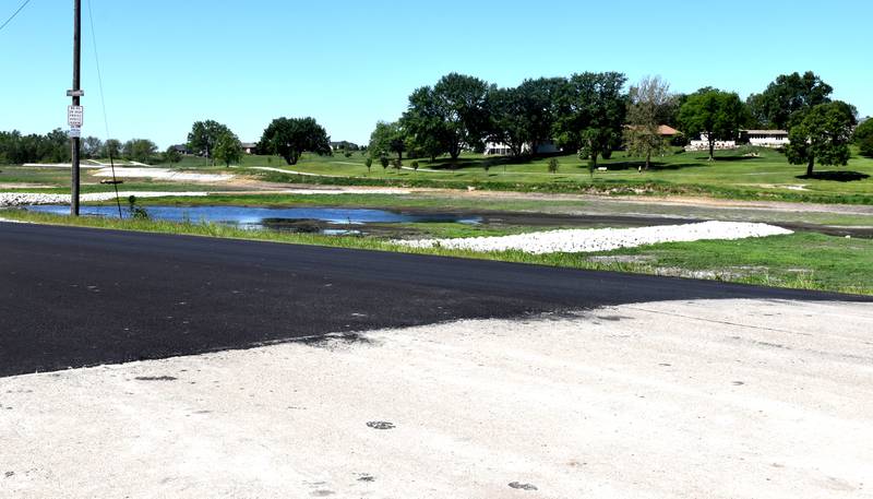 Lake Shore Drive, located on east of McKinley Lake, has new asphalt and is now open.